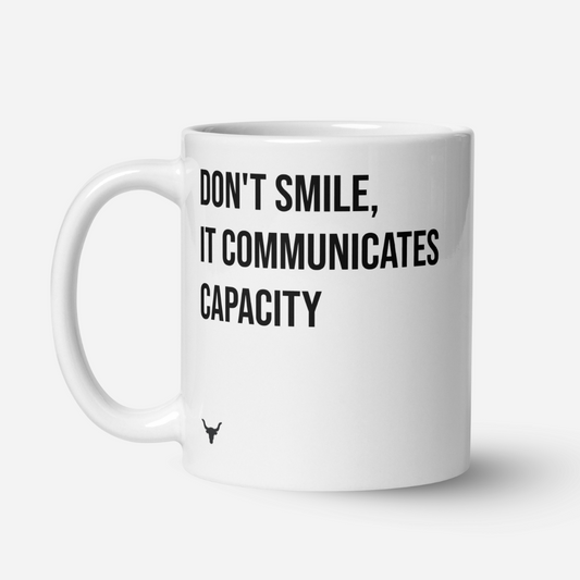Don't Smile it Communicates Capacity mug